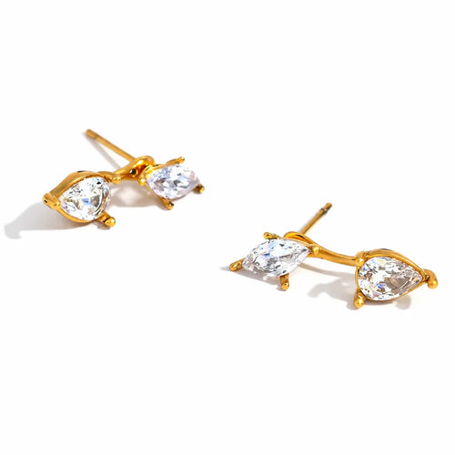 A pair of gold stud earrings with marquise-cut clear gemstones, displayed on a clean white background.